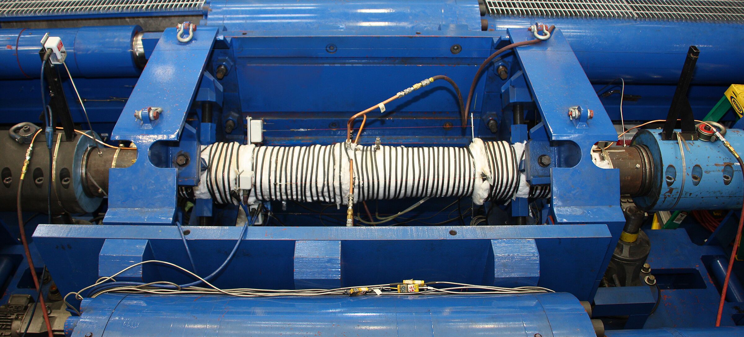 figure5-high-res One of Stress Engineering’s Combined Load Test Cells setup for pressure, axial load, and temperature testing
