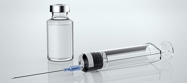 yringe with bottle of vaccine